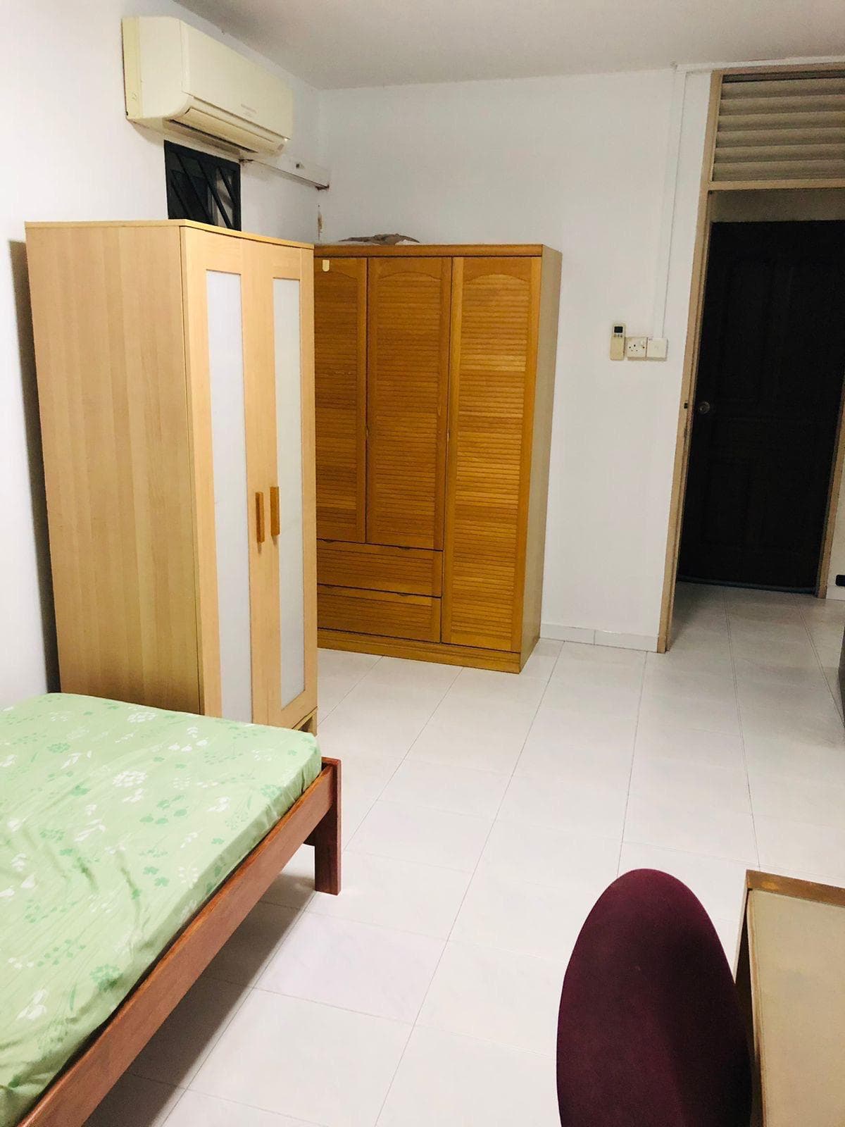 Organized bedroom with wardrobes